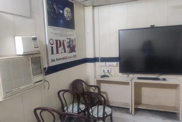 Teaching corner with smart board and IPA software poster (Tally, BUSY, SAP)