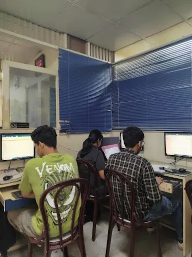 Students working at computers in a lab batch at IPA, Laxmi Nagar, Delhi