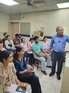 Faculty member explaining a topic to a full class at IPA, E-54 Laxmi Nagar